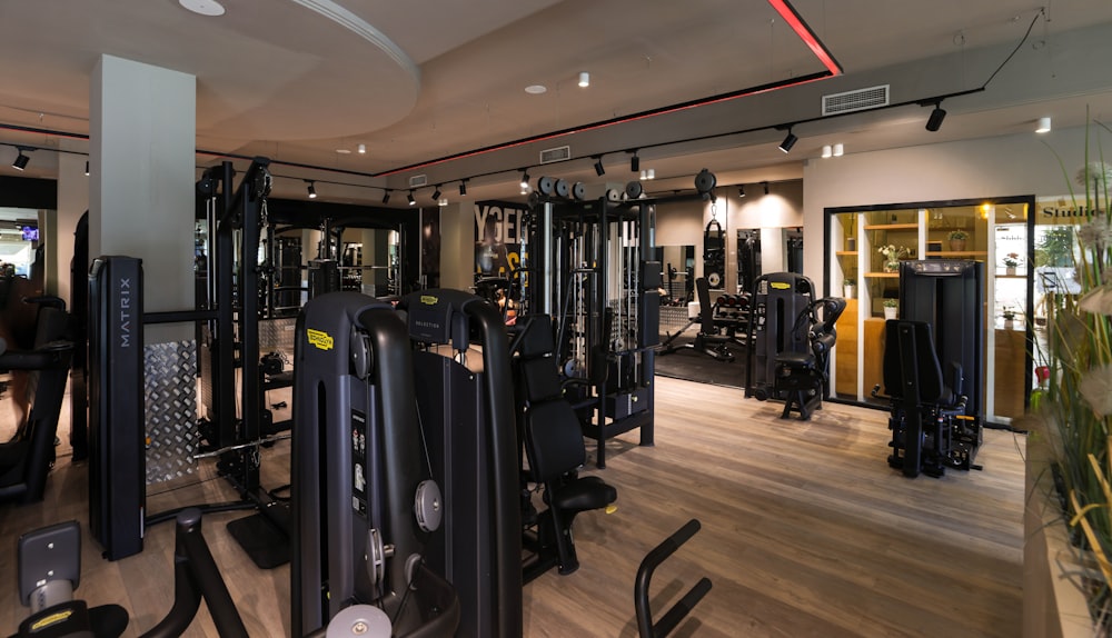 a gym with a lot of exercise equipment