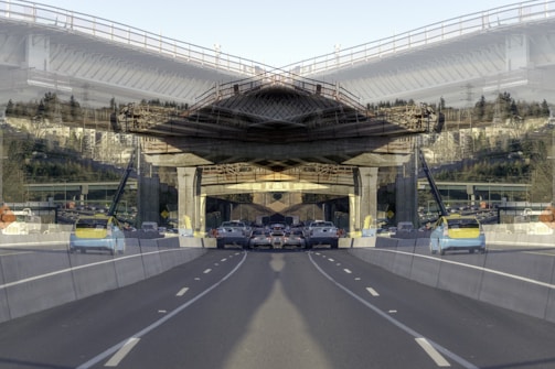 Time-lapse photo of a highway expansion project showing equipment and progress