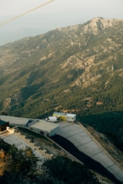 a train on a track in the mountains