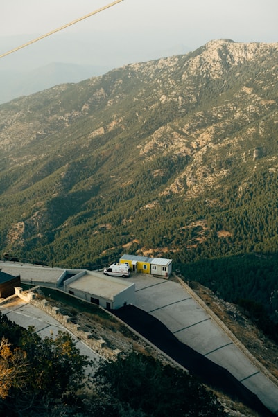 a train on a track in the mountains