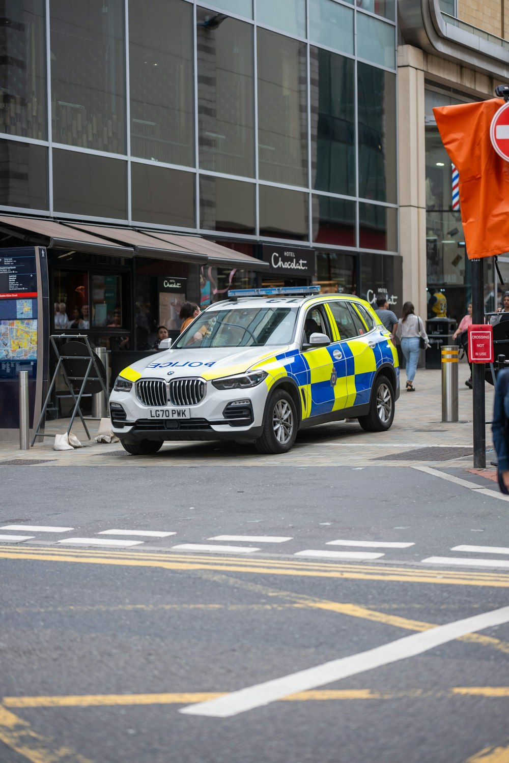 a police car parked on the side of the road