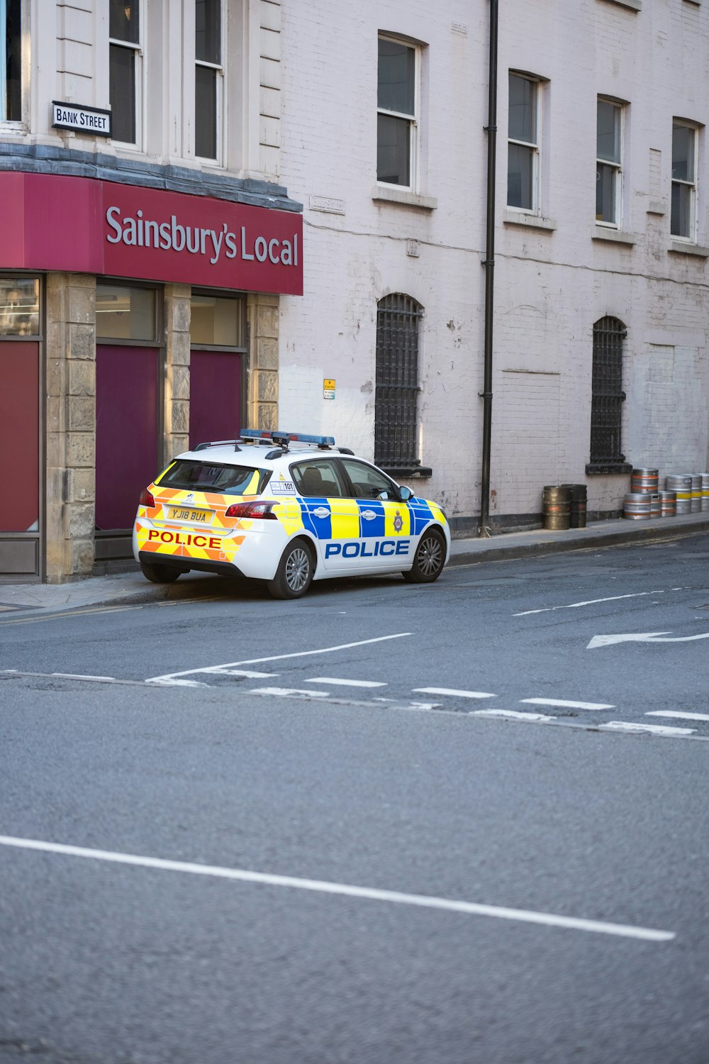 a police car parked on the side of the road