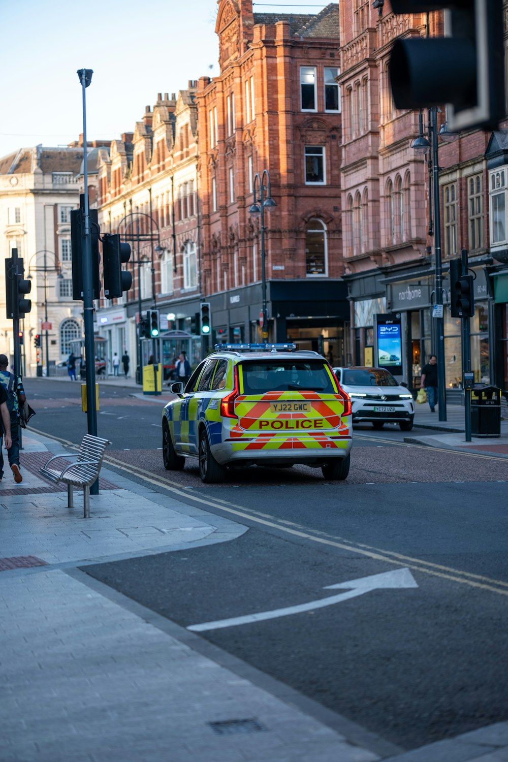 a police car parked on the side of the road