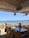A happy customer enjoying a meal at Nustyak Beach Front Restaurant.
