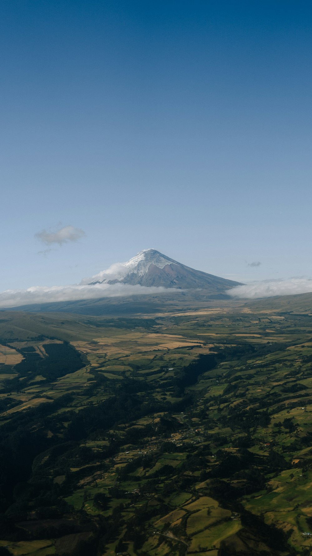 a view of a mountain from an airplane