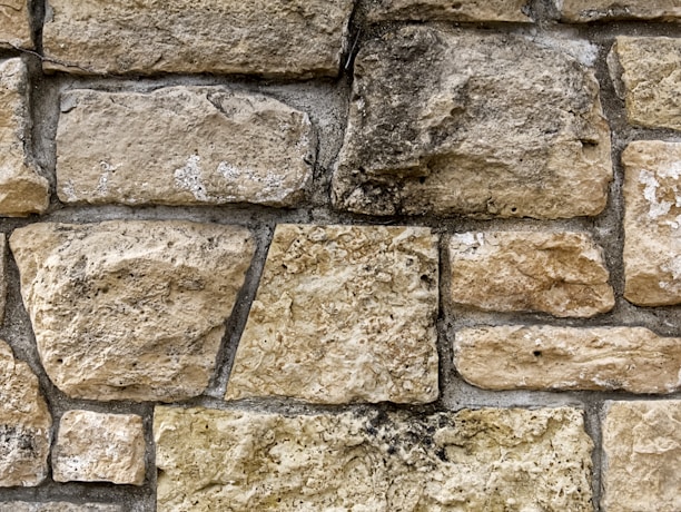 a close up of a stone wall made of rocks