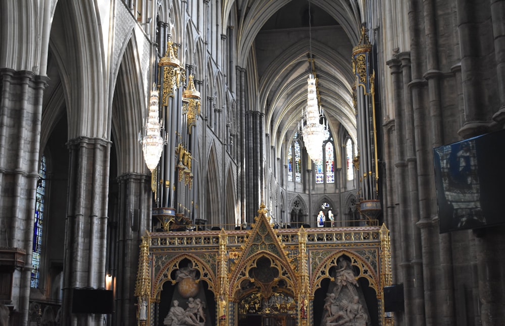 a large cathedral with a gold and silver alter