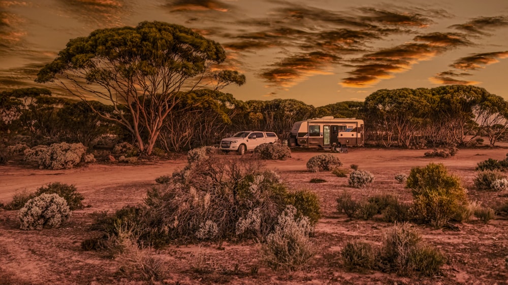 a truck parked in the middle of a desert