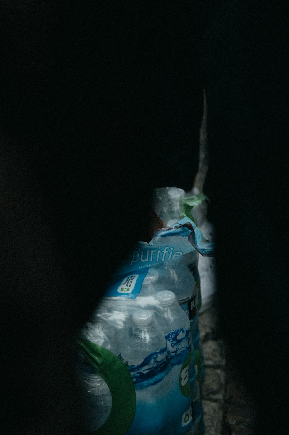 a bottle of water sitting on top of a table