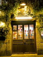 A welcoming doorway painted with the greenehouse & co logo.