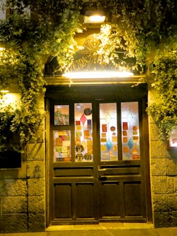 A warm, welcoming entrance to the die to live - lebanon ministry building with a sign pointing to the free food pantry.