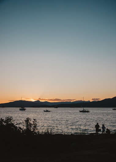a couple of boats that are in the water