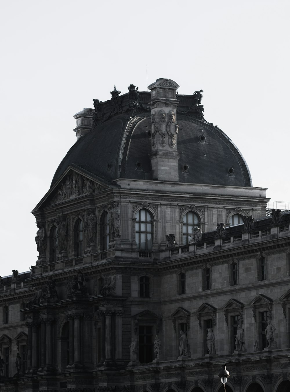 a large building with a clock on the top of it