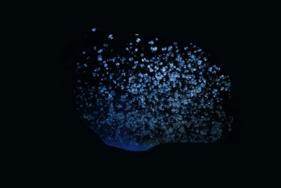 Dark space-like background with glowing blue Wi-Fi signal icons.