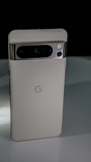 Google Pixel 10 Pro highlighting its camera lens and clean Android interface