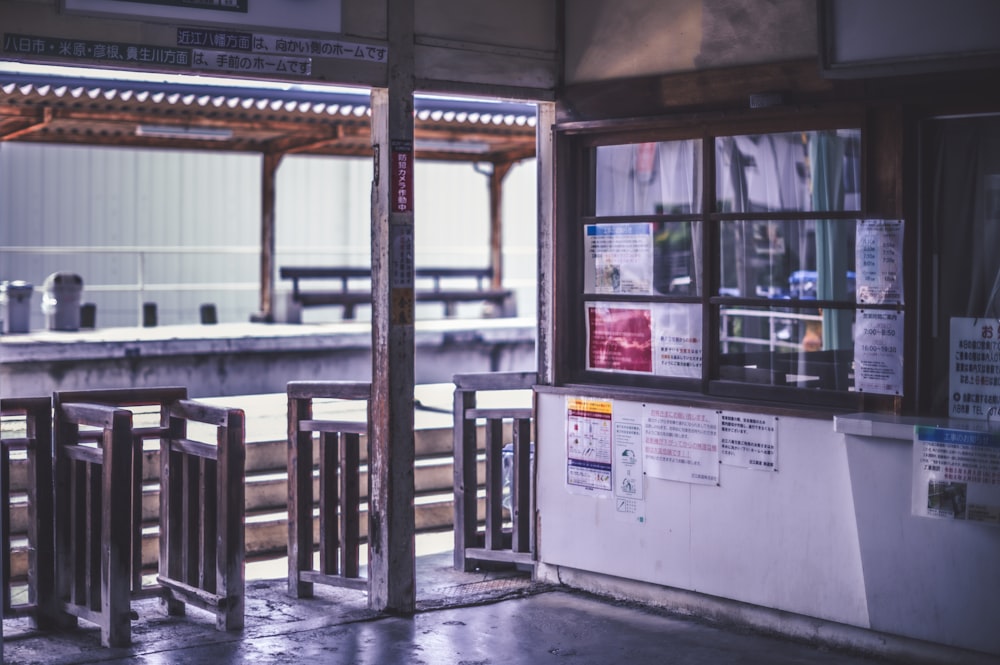 a train station with a train on the tracks