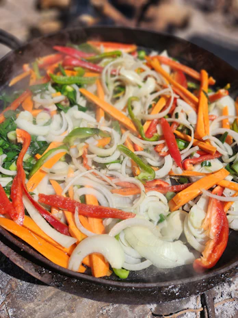 Colorful air fryer vegetable medley with peppers, zucchini, and carrots