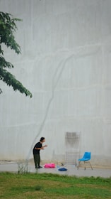 Animated mum figure gesturing towards her creative domain.