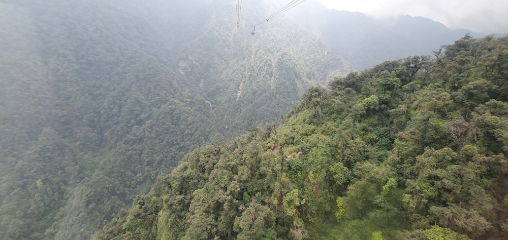 a view of a mountain with a cable going over it