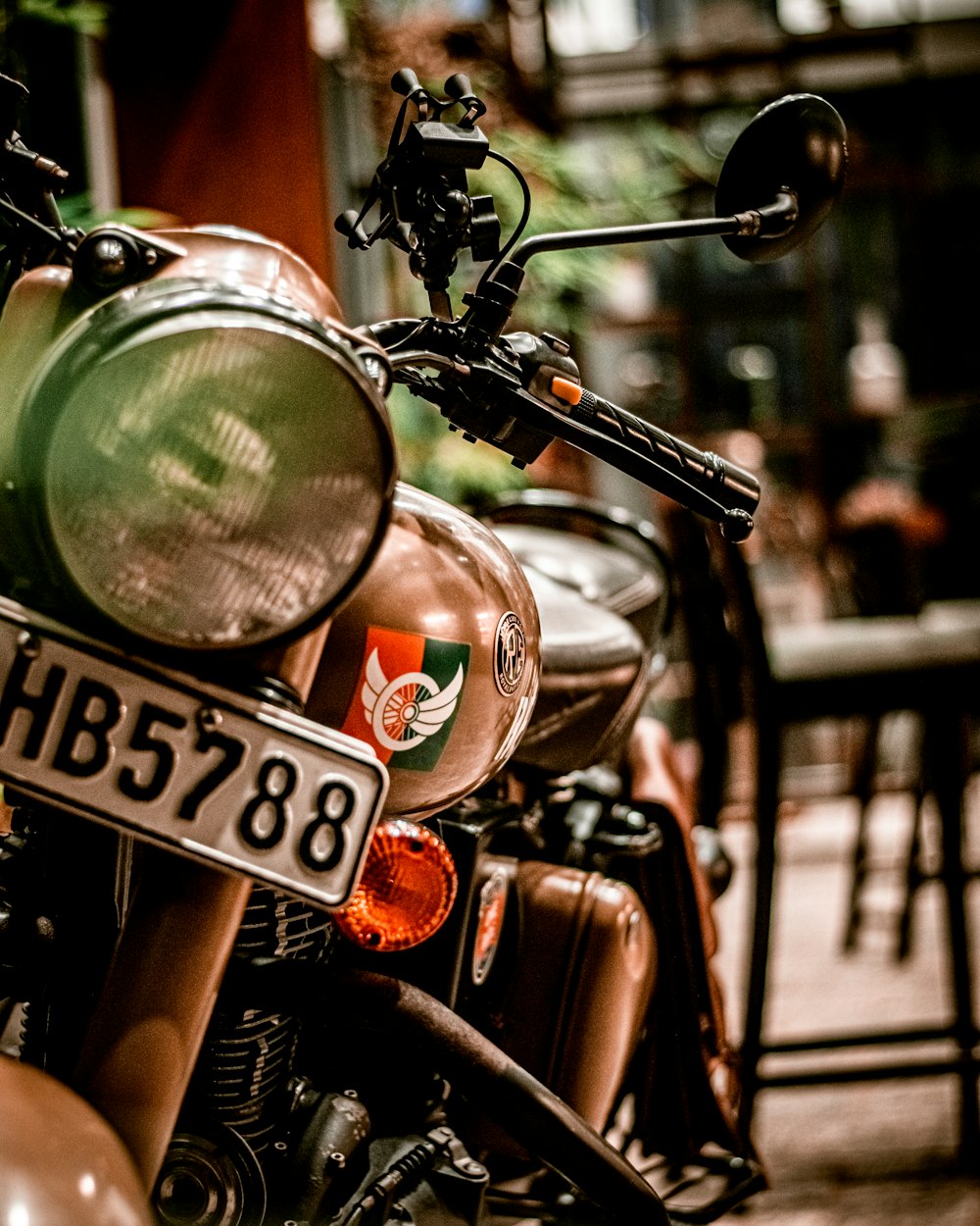 a close up of a motorcycle with a license plate