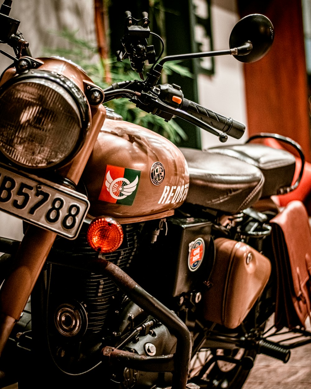 a close up of a motorcycle parked on a street