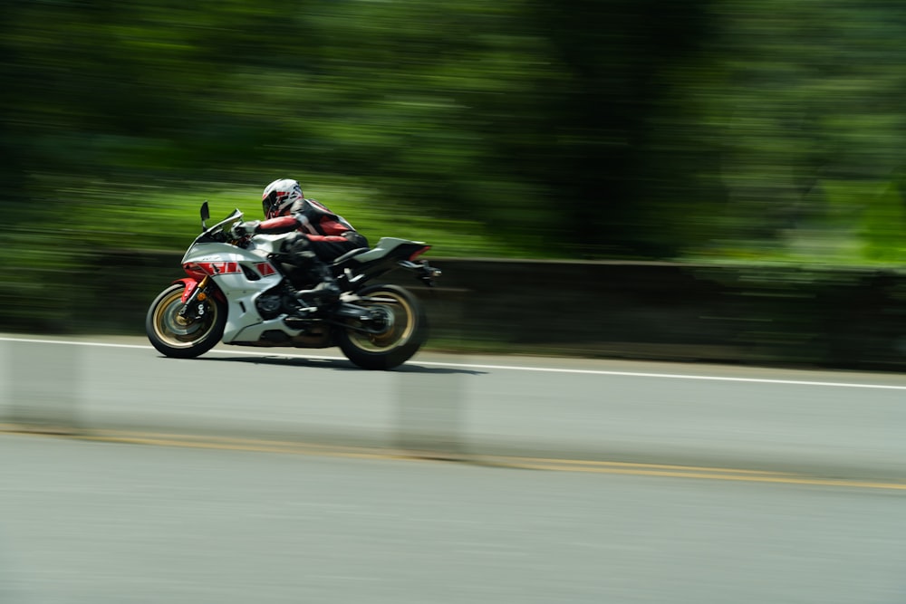 a person riding a motorcycle on a road