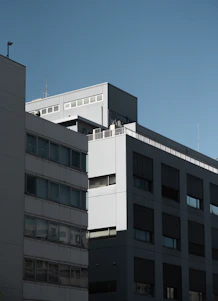 Modern office building with sleek design and natural lighting.