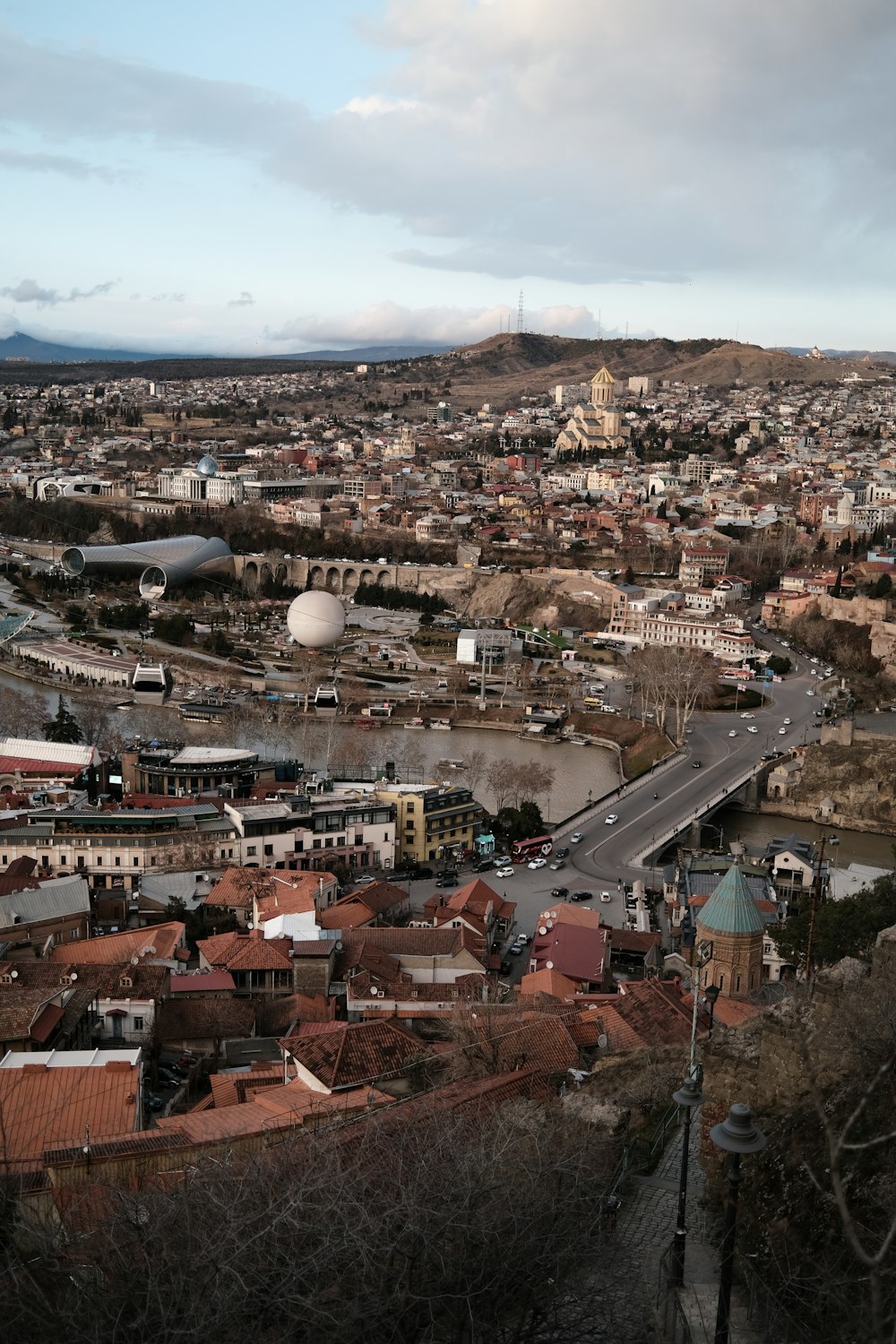 a view of a city from a hill