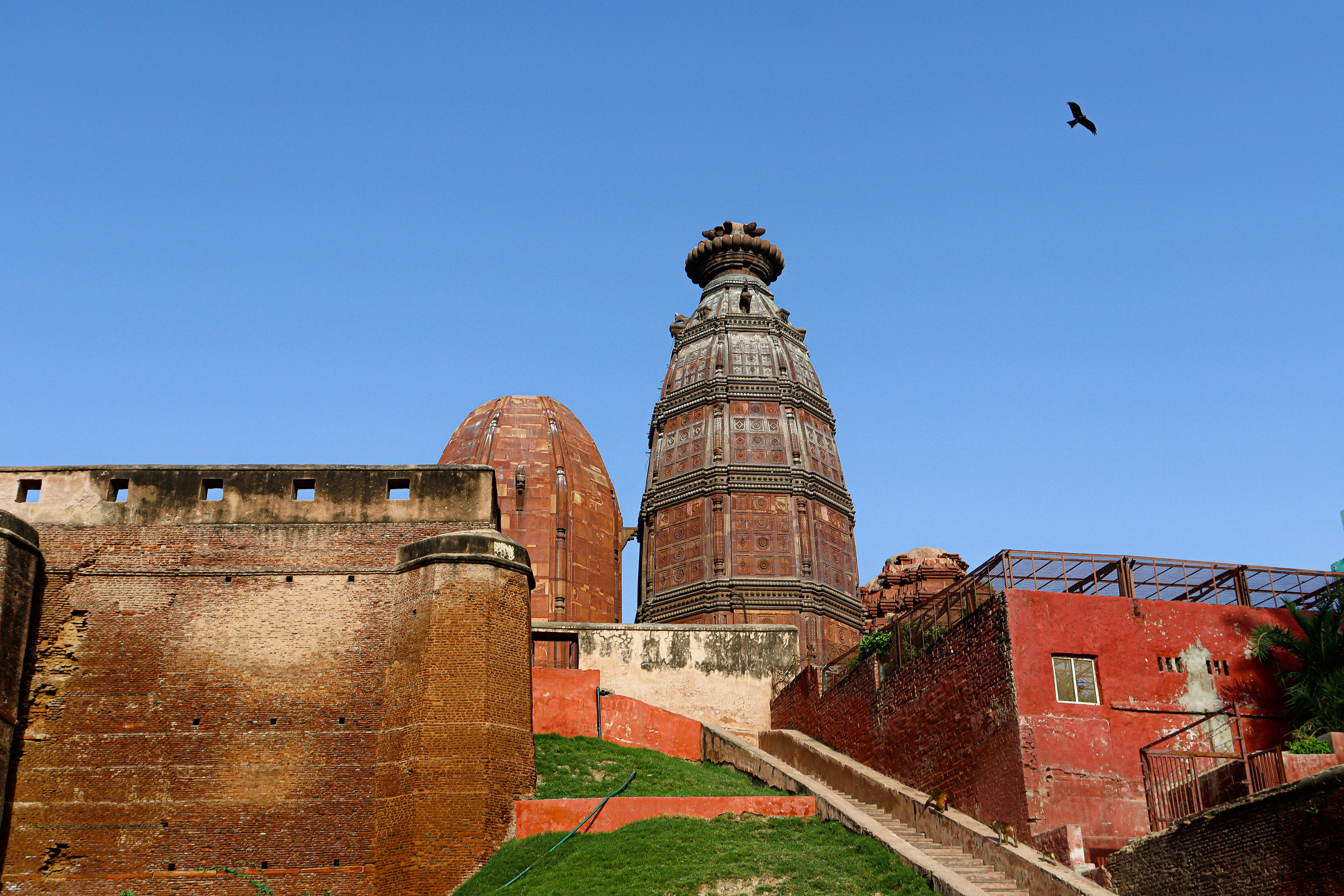 Radha Madan Mohan Temple in the holy city of Vrindavan Madan Mohan Temple, Vrindavan Located near the Kali Ghat in Vrindavan, Madan Mohan Temple dedicated to Sri Krishna is believed to be the oldest existing temple in Vrindavan that stands 18.288 metres tall. Built in the year 1580, this shrine is located within fortified walls on a hillock. Despite being in ruins, this temple offers a certain sense of charm and every pilgrim wish to visit here. Madan Mohan Temple is artistically carved, oval in shape and is built with red stone at Aditya Tila.