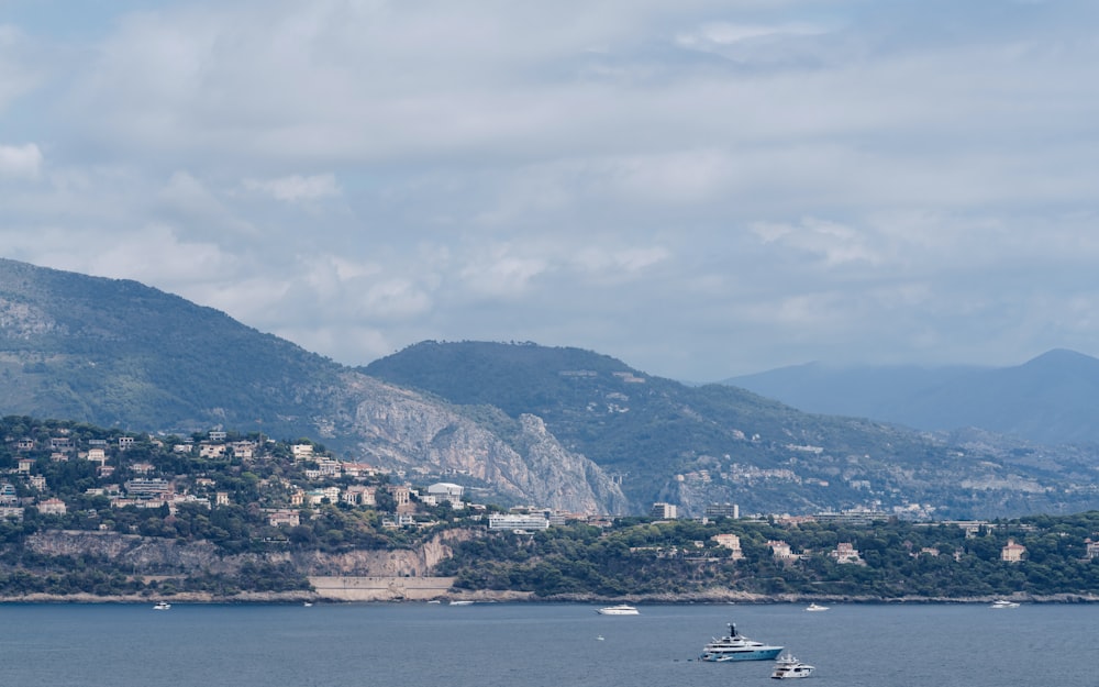 a body of water with boats floating on top of it