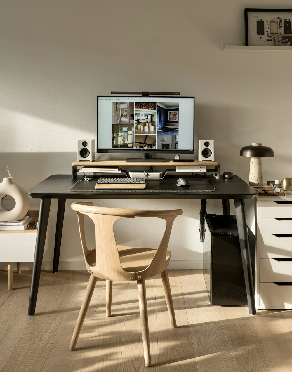 a desk with a computer on top of it