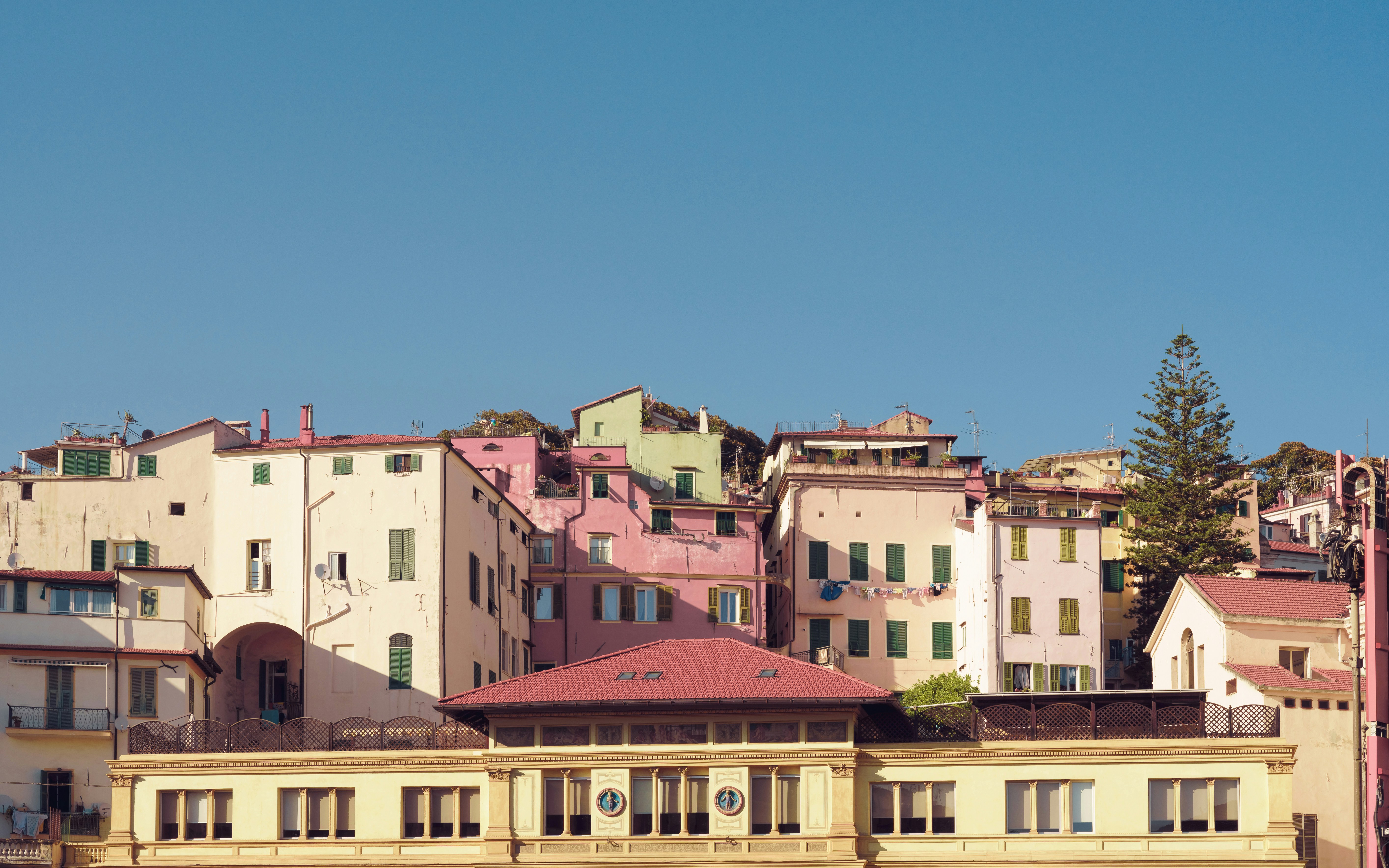 a group of buildings that are next to each other, 2023, September – Walking the streets of Sanremo