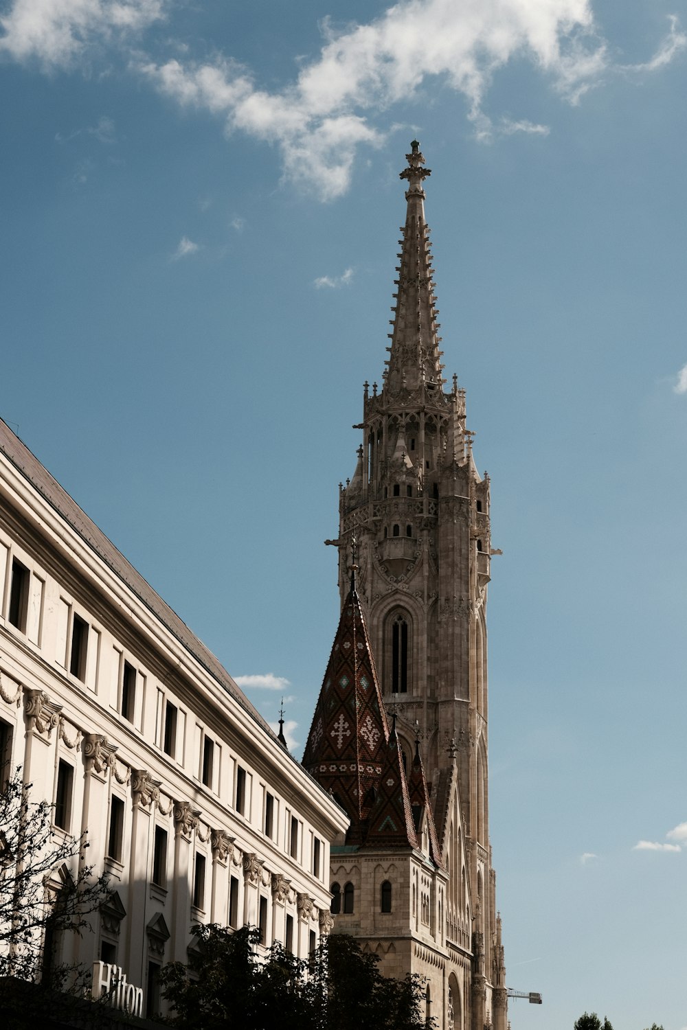 a very tall building with a clock on it's side