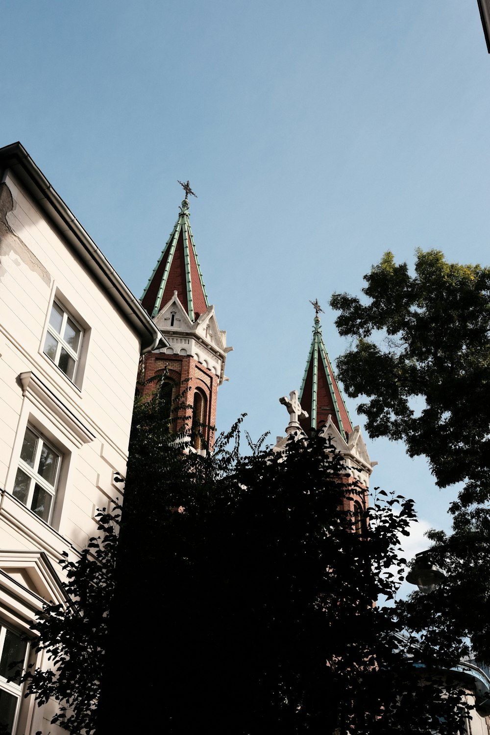 a tall building with a clock on the top of it