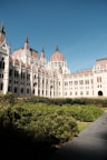a large white building with many windows and towers