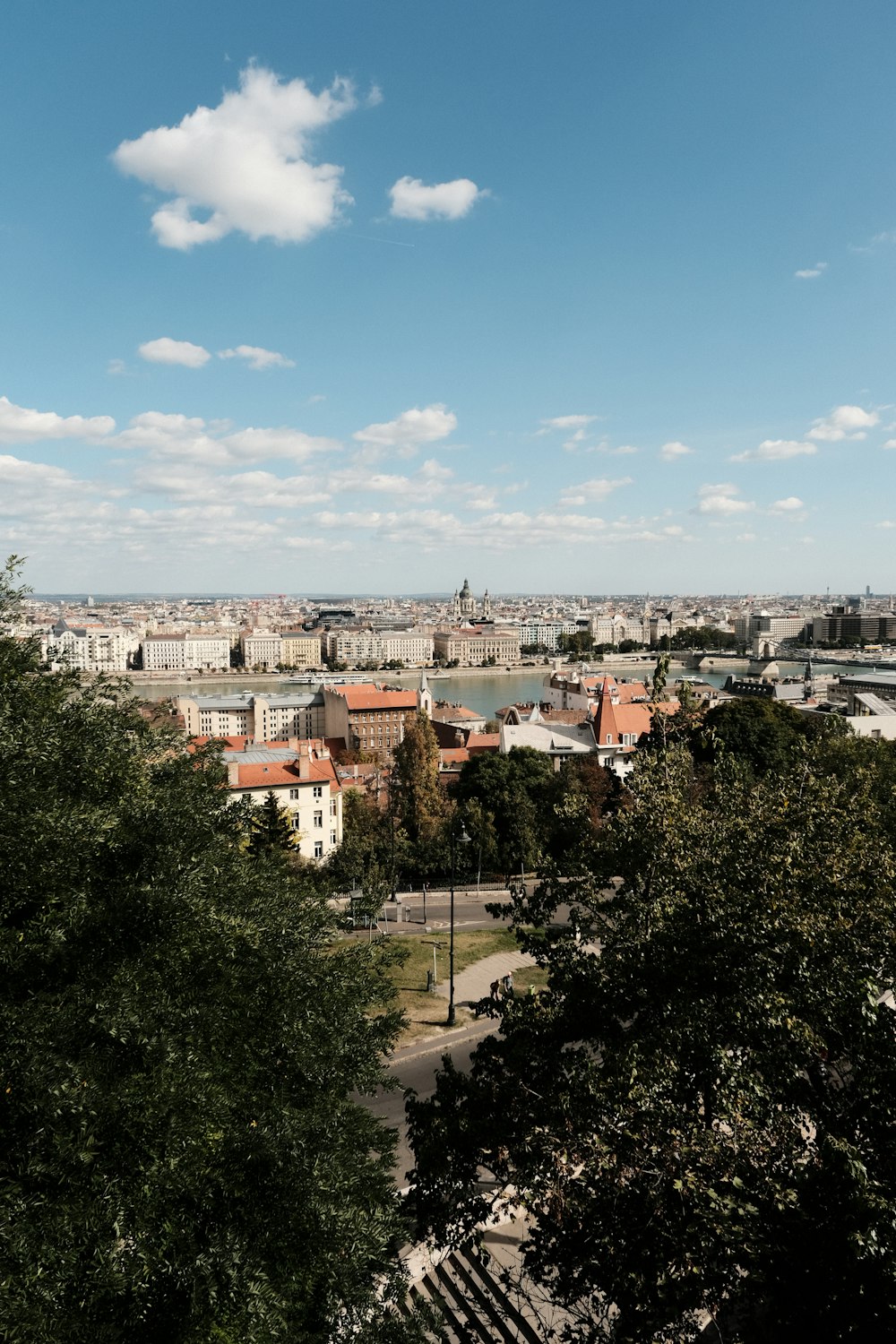 a view of a city from a hill