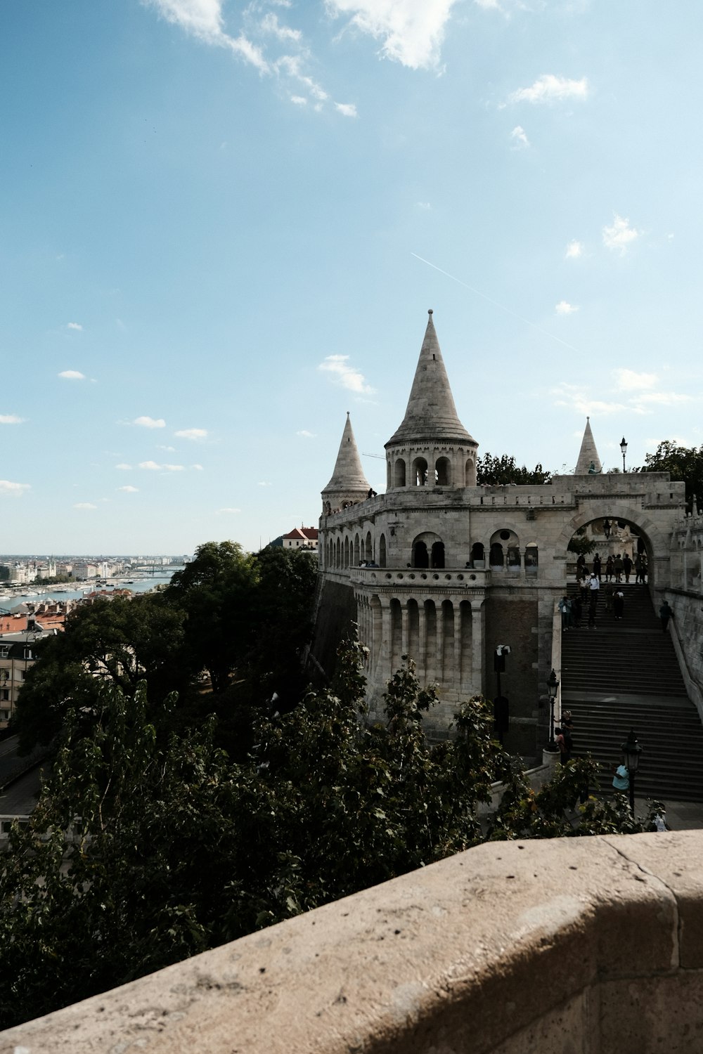 a view of a castle from the top of a hill