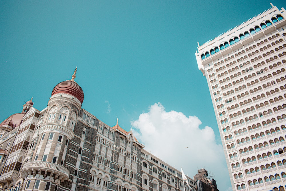 a very tall building with a clock on it's side