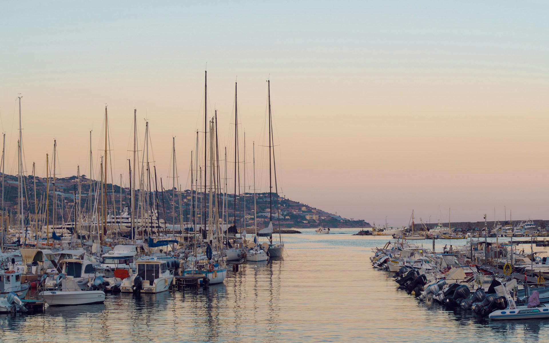 a bunch of boats that are in the water