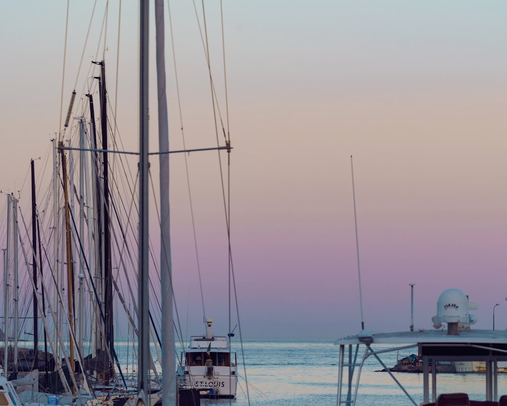 a group of boats that are sitting in the water