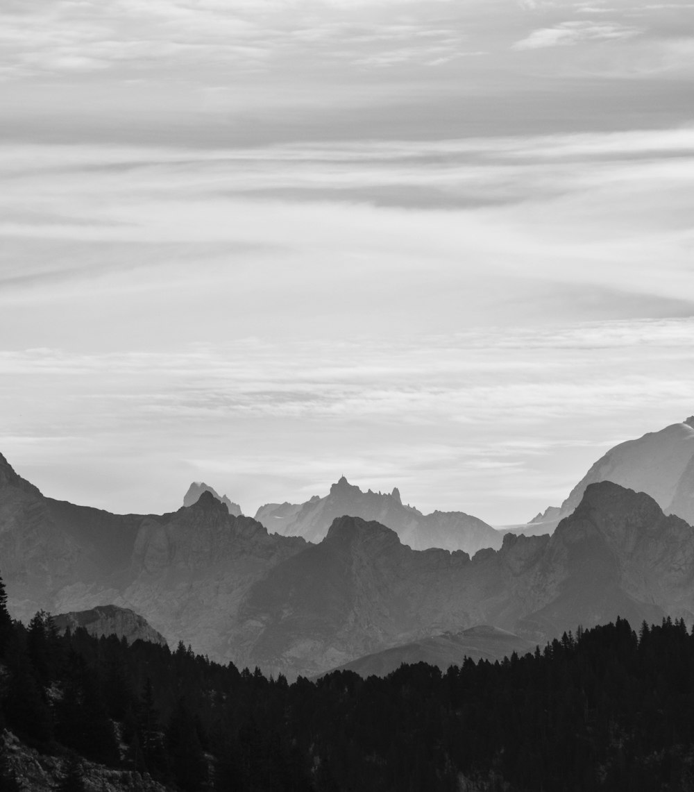 a black and white photo of a mountain range