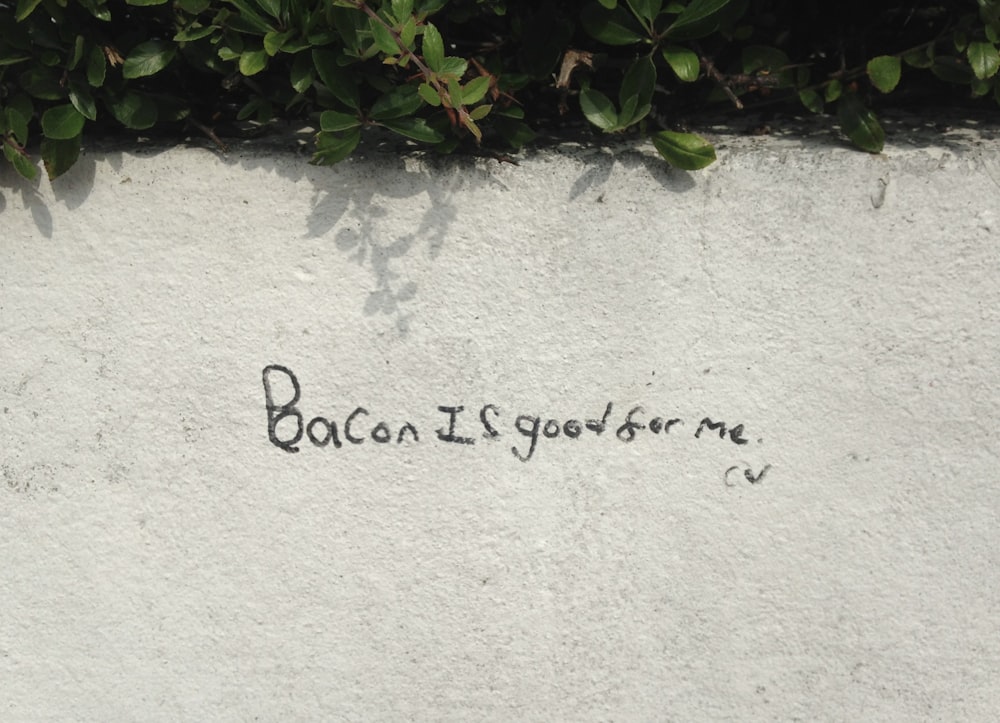 a wall with writing on it that says booon is good for me