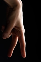Close-up of a digital character’s fluid hand gesture, showcasing detailed motion capture.