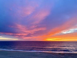 A stunning sunset over a serene beach.