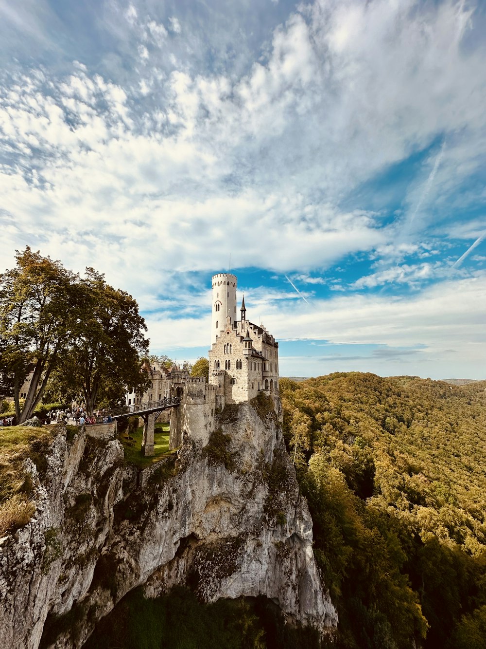 a castle sitting on top of a cliff