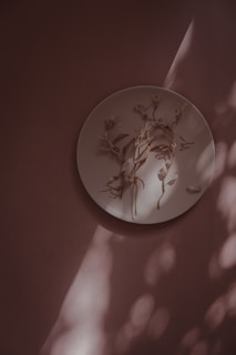 Soft natural light illuminating a beautifully arranged dessert plate inspired by blooming flowers