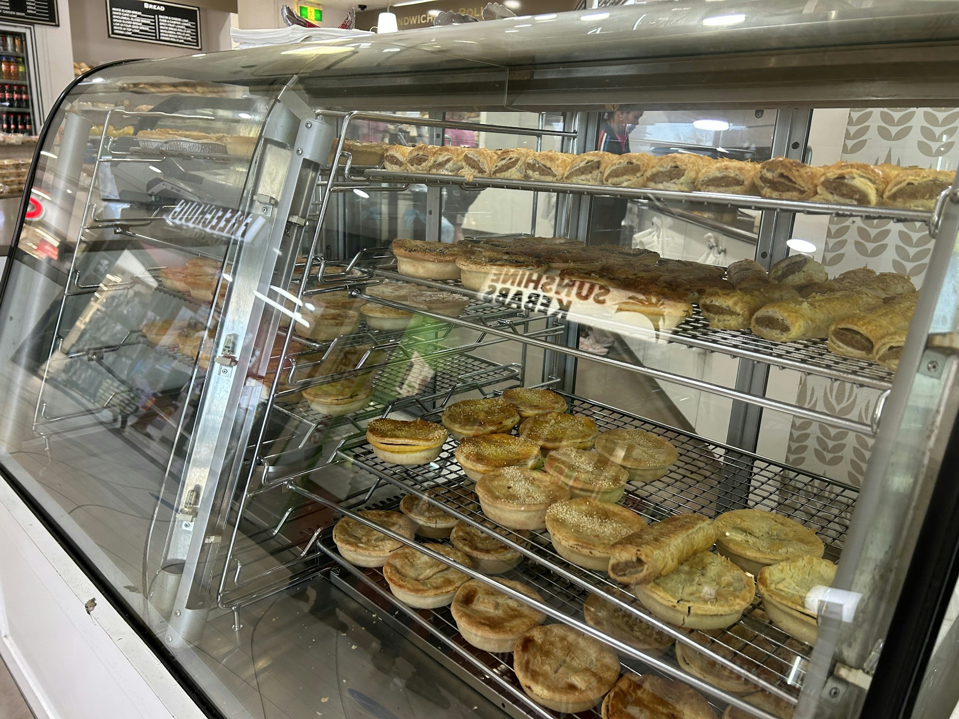 woman wearing yellow long-sleeved dress under white clouds and blue sky during daytime