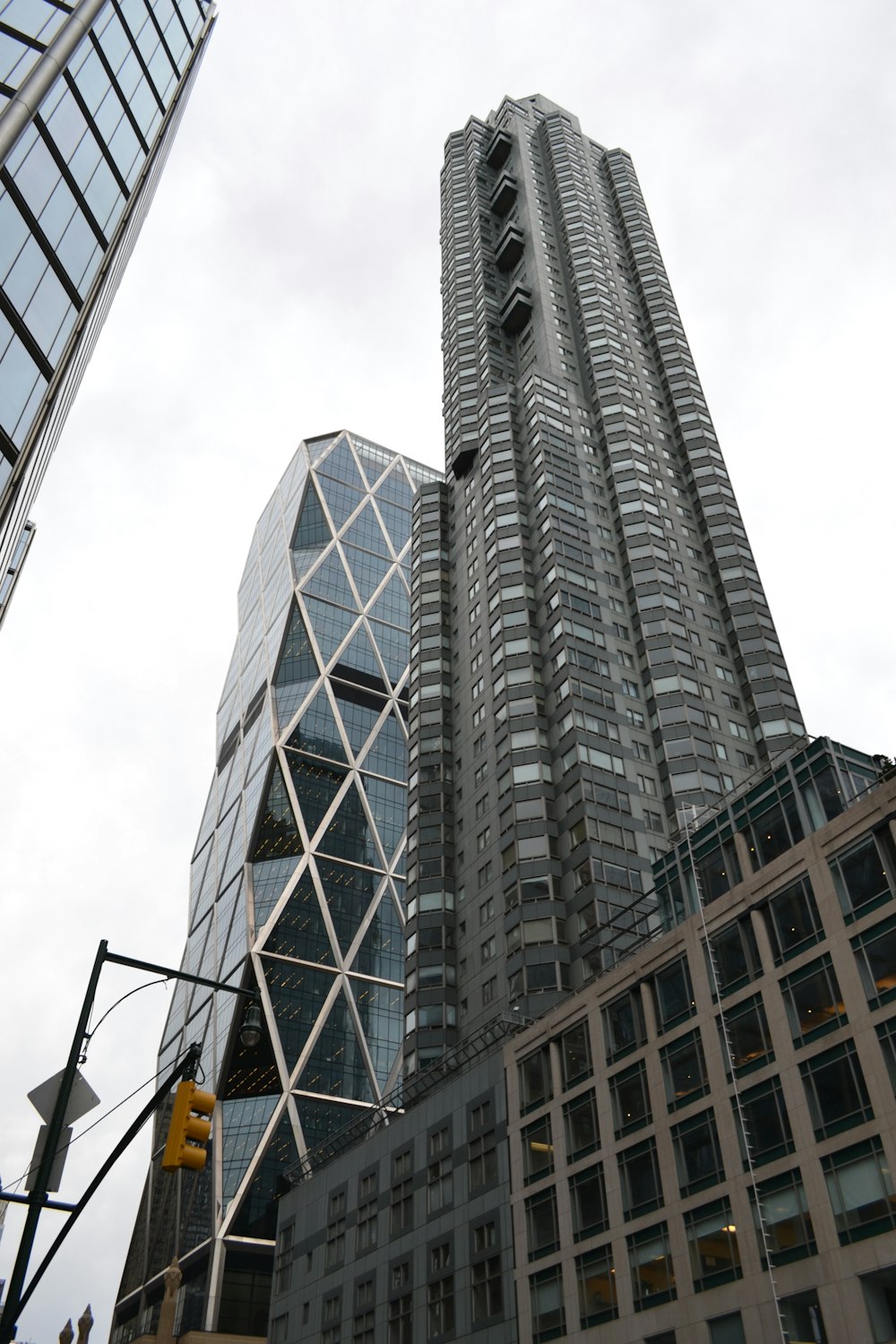 a very tall building next to a very tall building