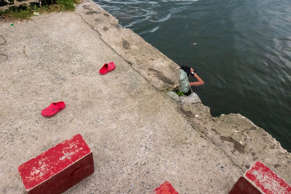 a person swimming in a body of water