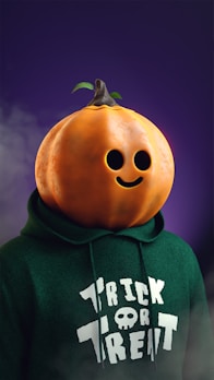 A casual black t-shirt with a neon green Halloween-themed print, styled with relaxed jeans.